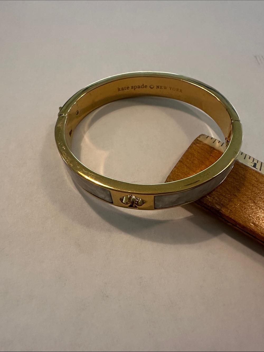 kate spade Gold and White Enamel Hinged Bangle Bracelet